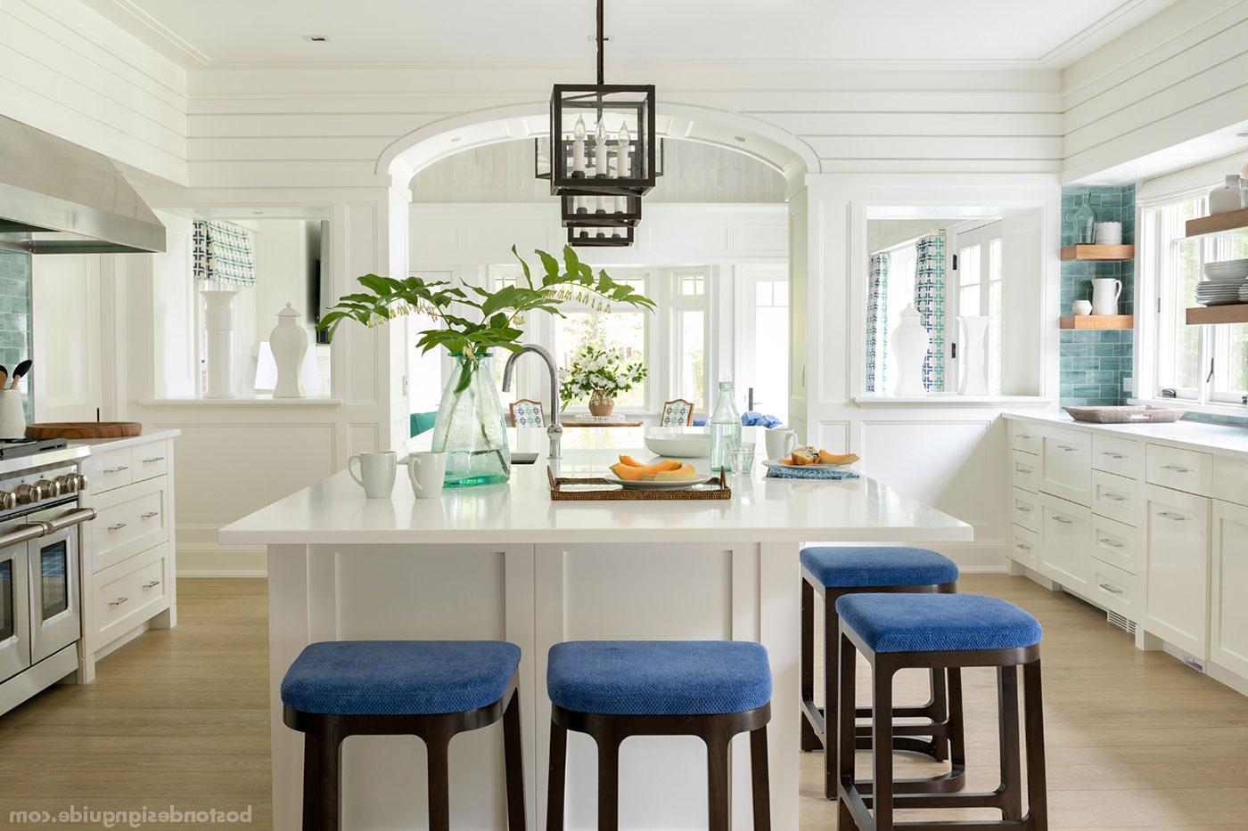A coastal Cape Cod kitchen within a home designed to house two families